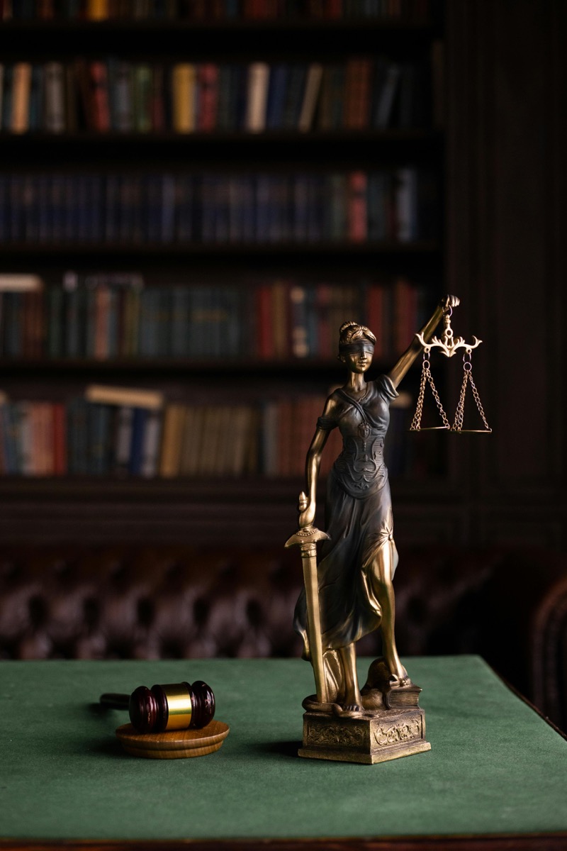 Lady Justice in a Florida law library, representing assault and battery charges
